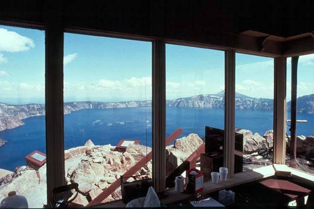 A view from within the Observation Station includes the rocks outside and bright blue lake beyond. A view from within the Observation Station includes the rocks outside and bright blue lake beyond.